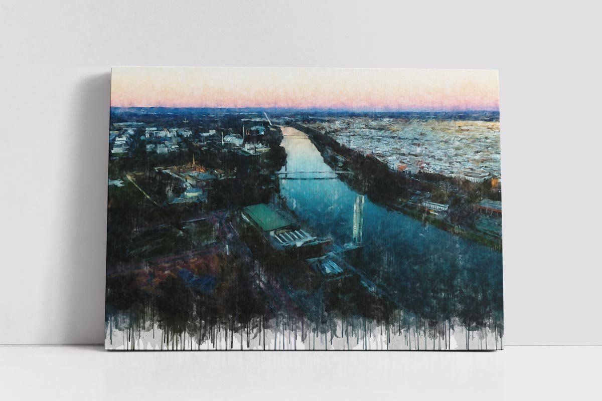Cuadro moderno de Sevilla con vista aérea de la Expo al atardecer, el río Guadalquivir en el centro y la ciudad extendiéndose hacia el horizonte