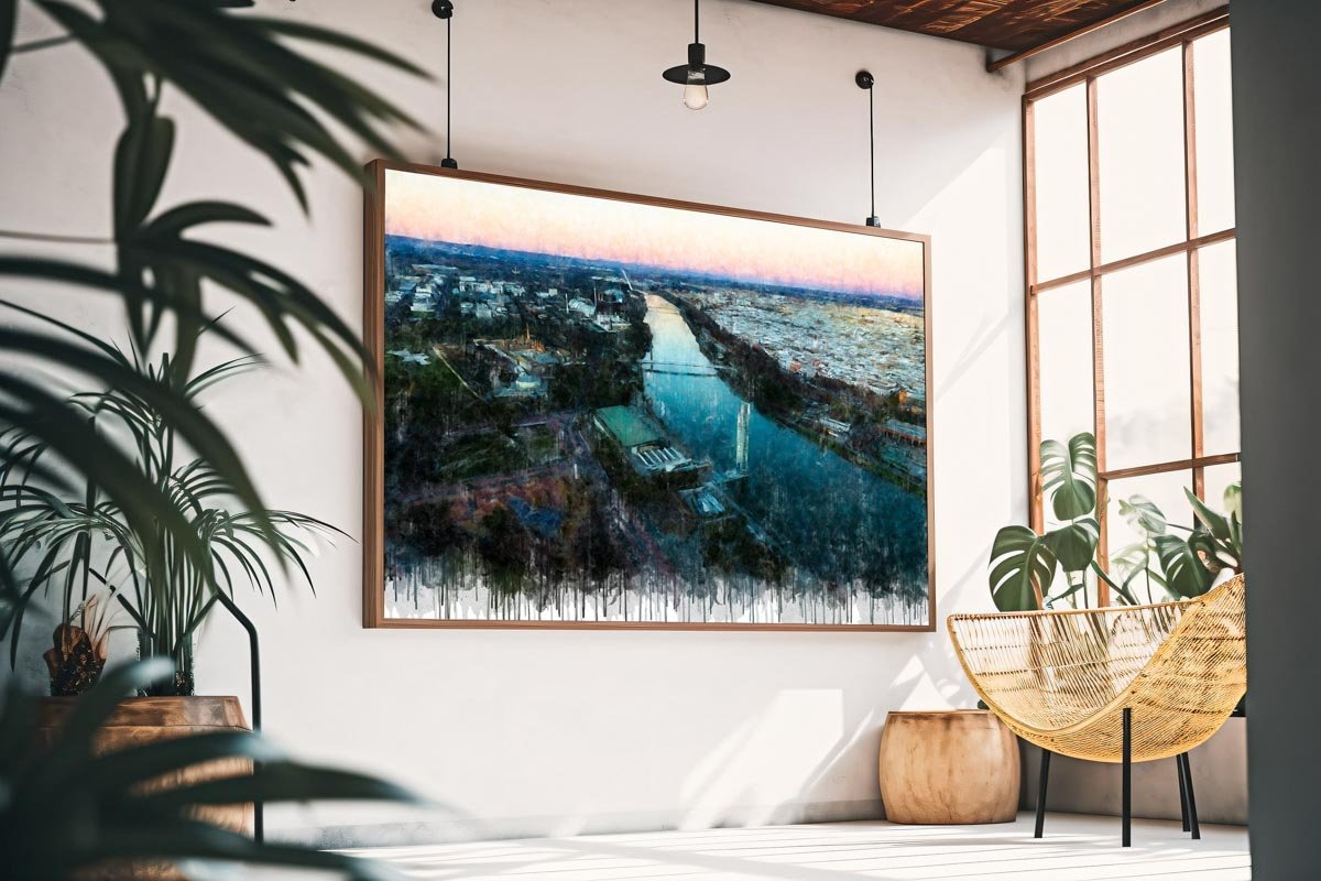 Cuadro moderno de Sevilla con vista aérea de la Expo al atardecer, el río Guadalquivir en el centro y la ciudad extendiéndose hacia el horizonte